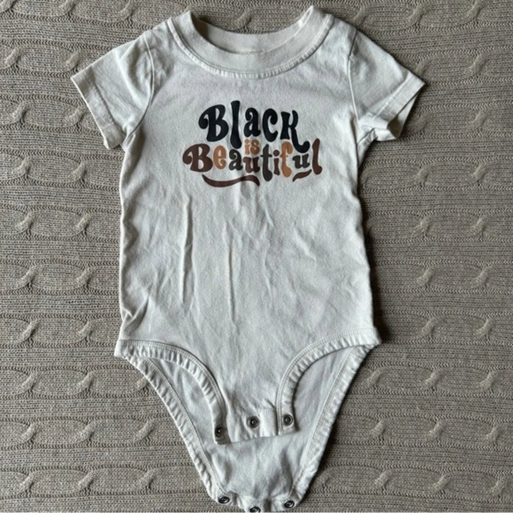 EUC Carter’s Unisex Short Sleeve Onesie, “Black is Beautiful,” 9 Months